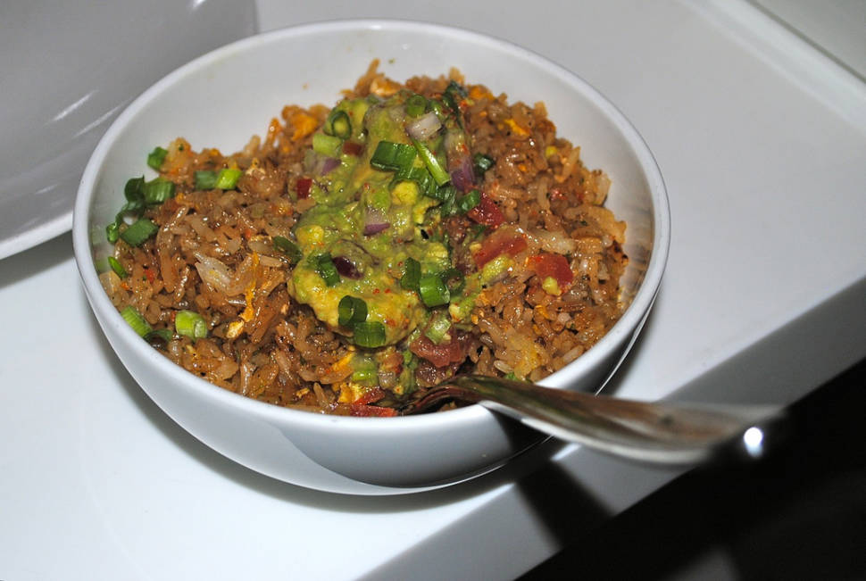 Plantain fried rice with avocado salad