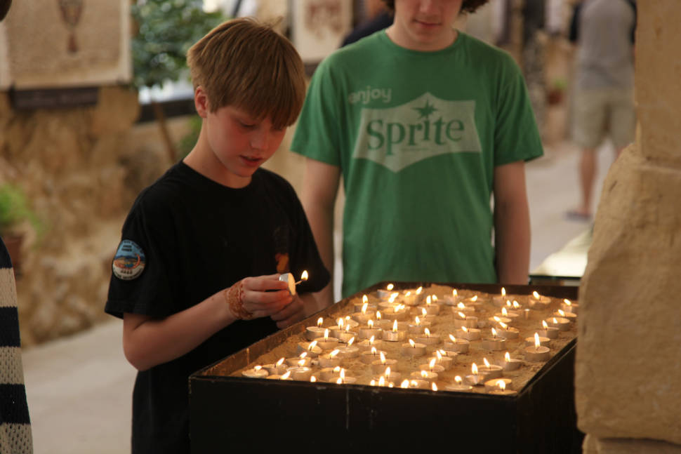 Lighting Candles at Mt Nebo