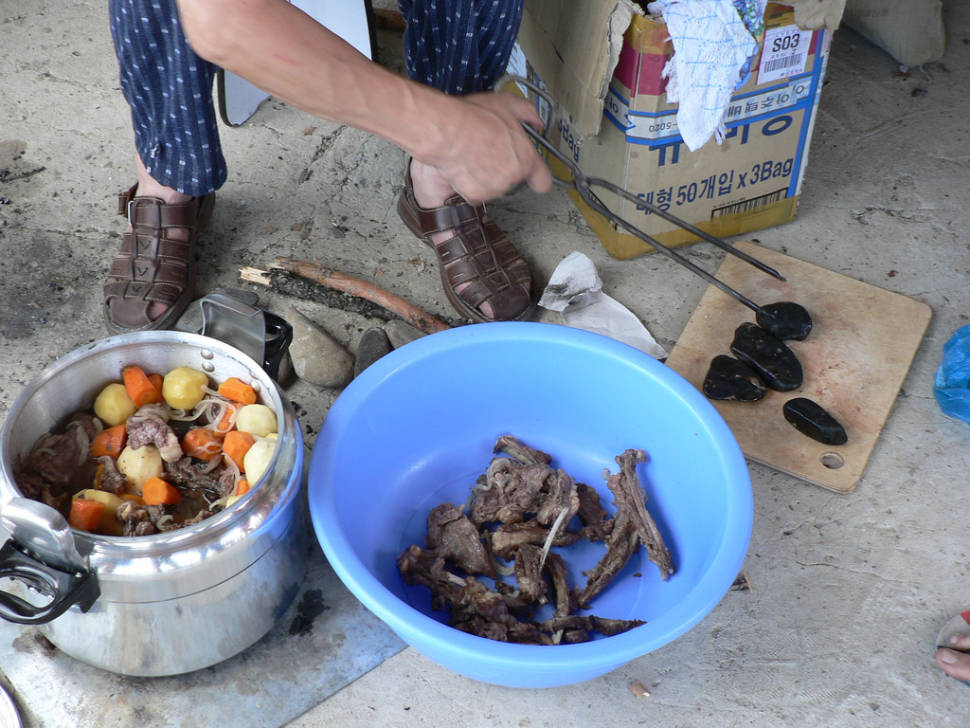 Khorkhog—meat, veggies, and hot stones for cooking