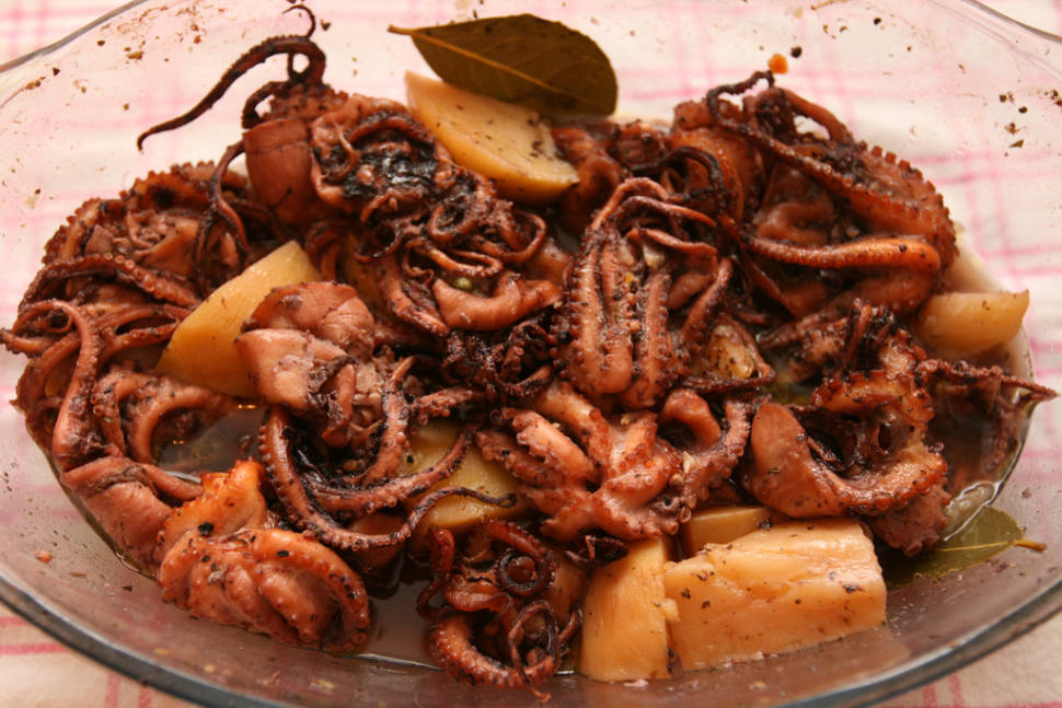 Baby octopus with young potatoes, olive oil, lemon juice and bay leaves