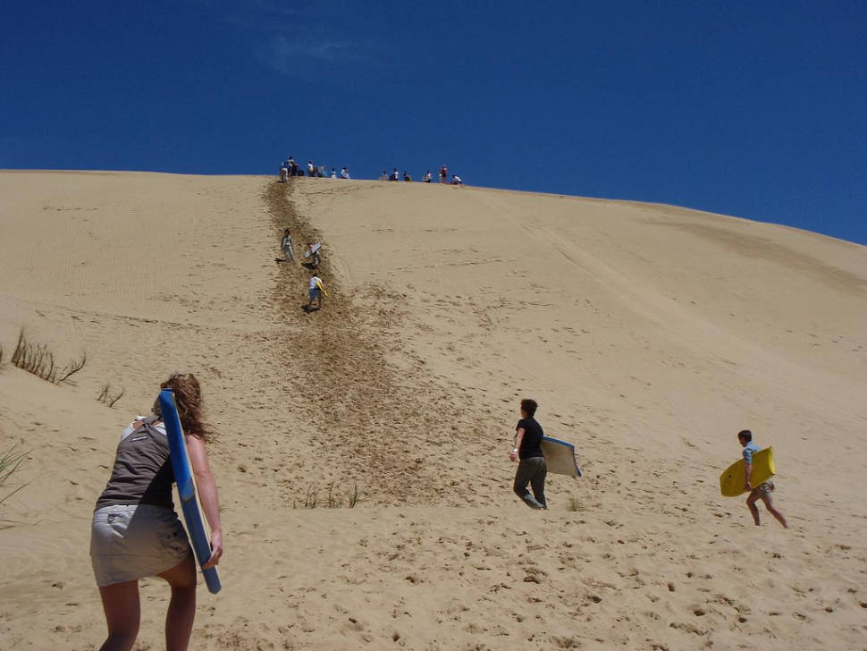 Body Board Down the Sand Dunes in New Zealand - Best Season