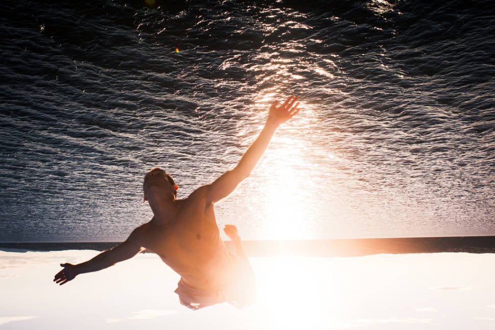 Swimming in the Midnight Sun in Norway - Best Season