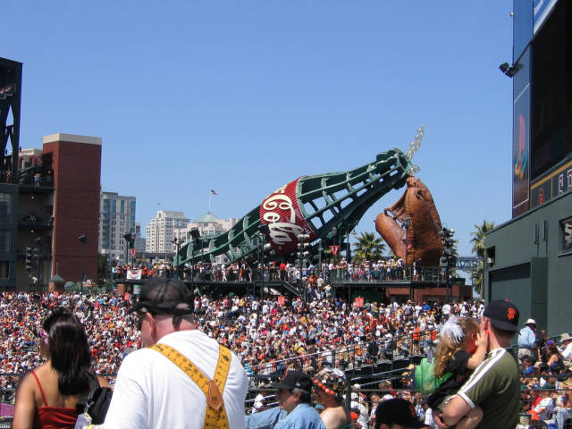 Big stupid Coke Bottle and Big Giant Glove
