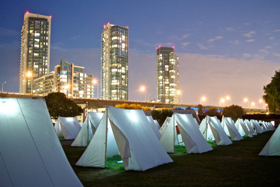 Each tent features a separate art piece