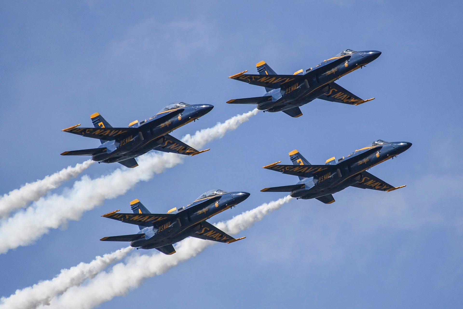 Jacksonville Air Show military aircraft flying over beach